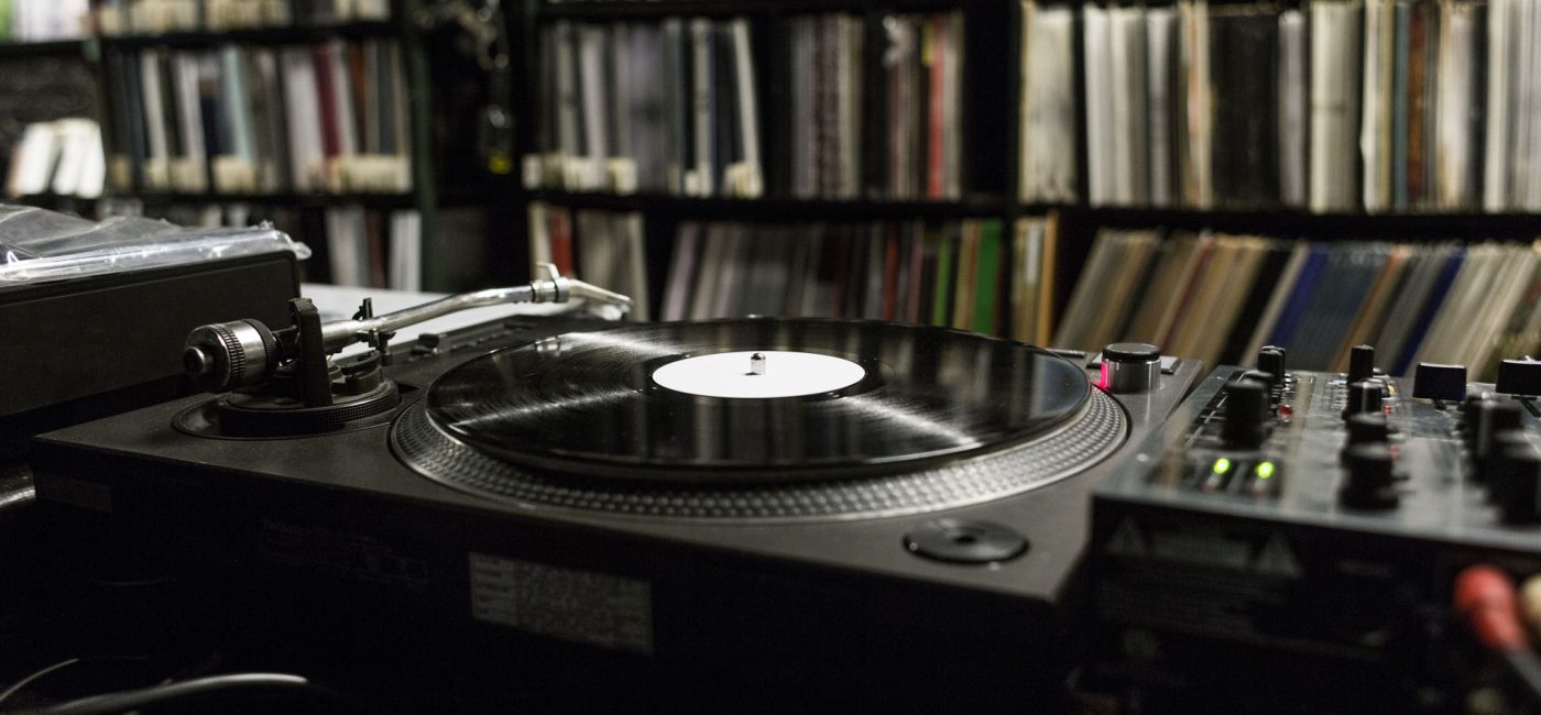 DJ Turntable Playing Vinyl at Record Store